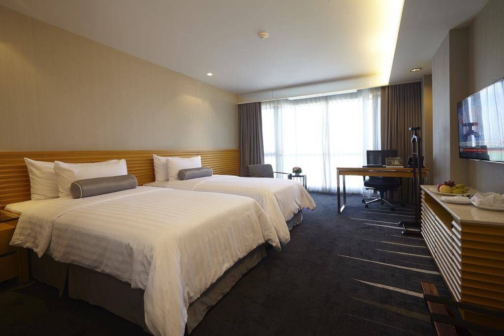 slaapkamer van lao plaza hotel in laos vientiane