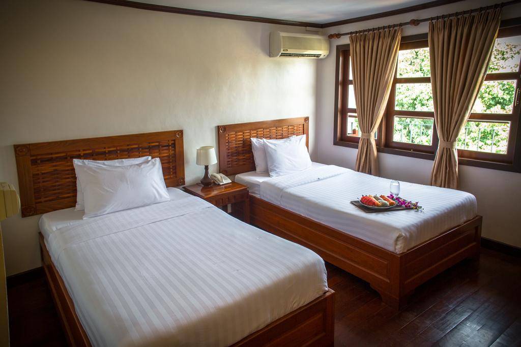 kamer in lao orchid hotel in laos vientiane