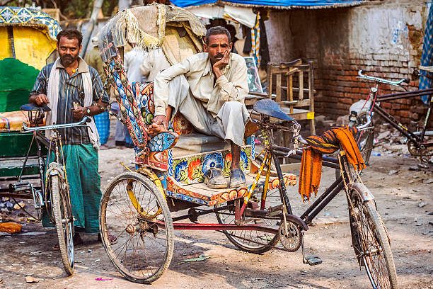 Riksja rit in Oud Delhi India